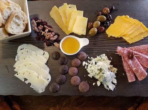 cheese board featuring Caves of Faribault cheese courtesy Faribault Chamber of Commerce.